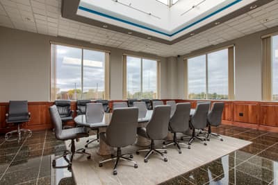 Professional boardroom with skylight and cherry wainscoting at Millennium Plaza